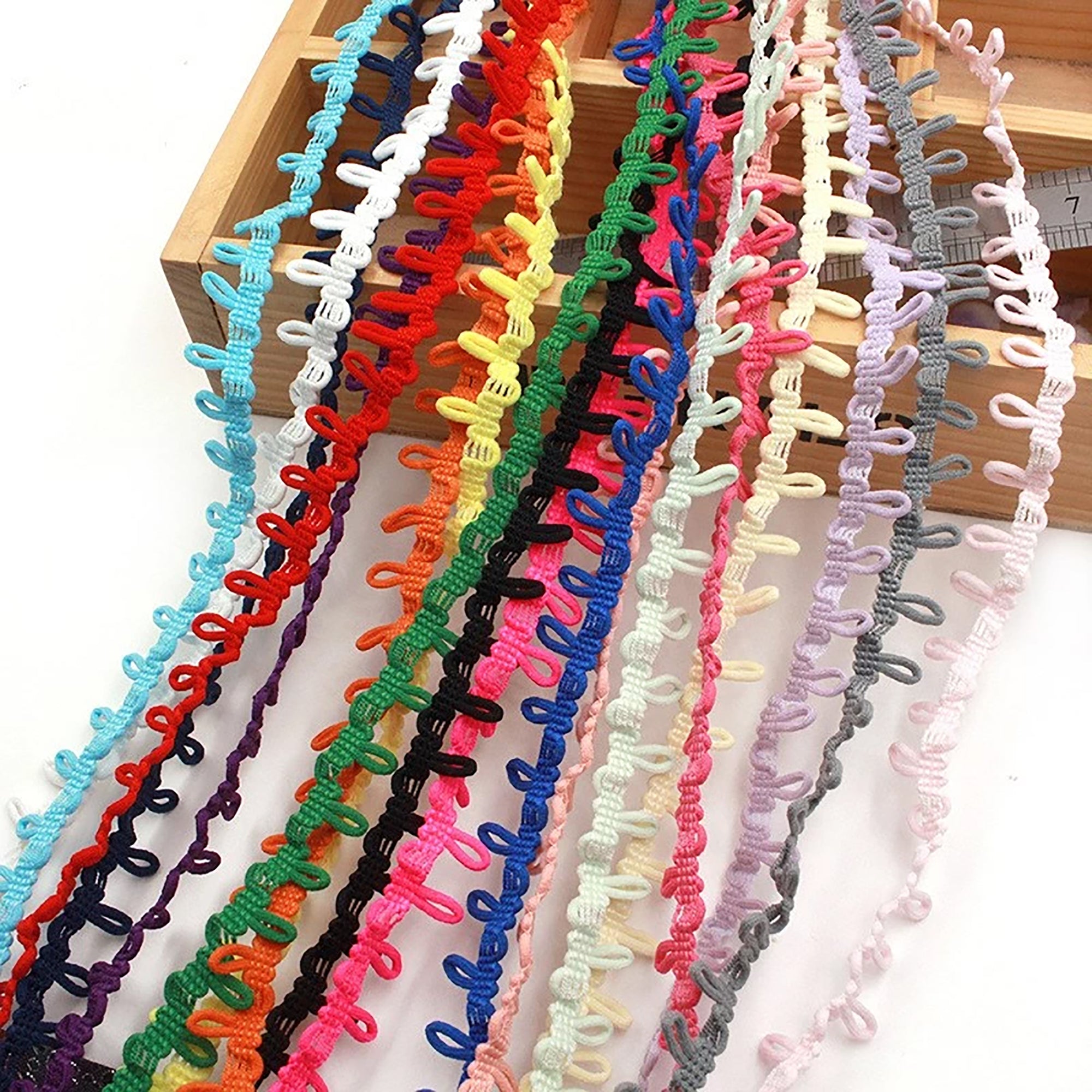Looped Elastic Button Trim 1/2" Sold By Yard